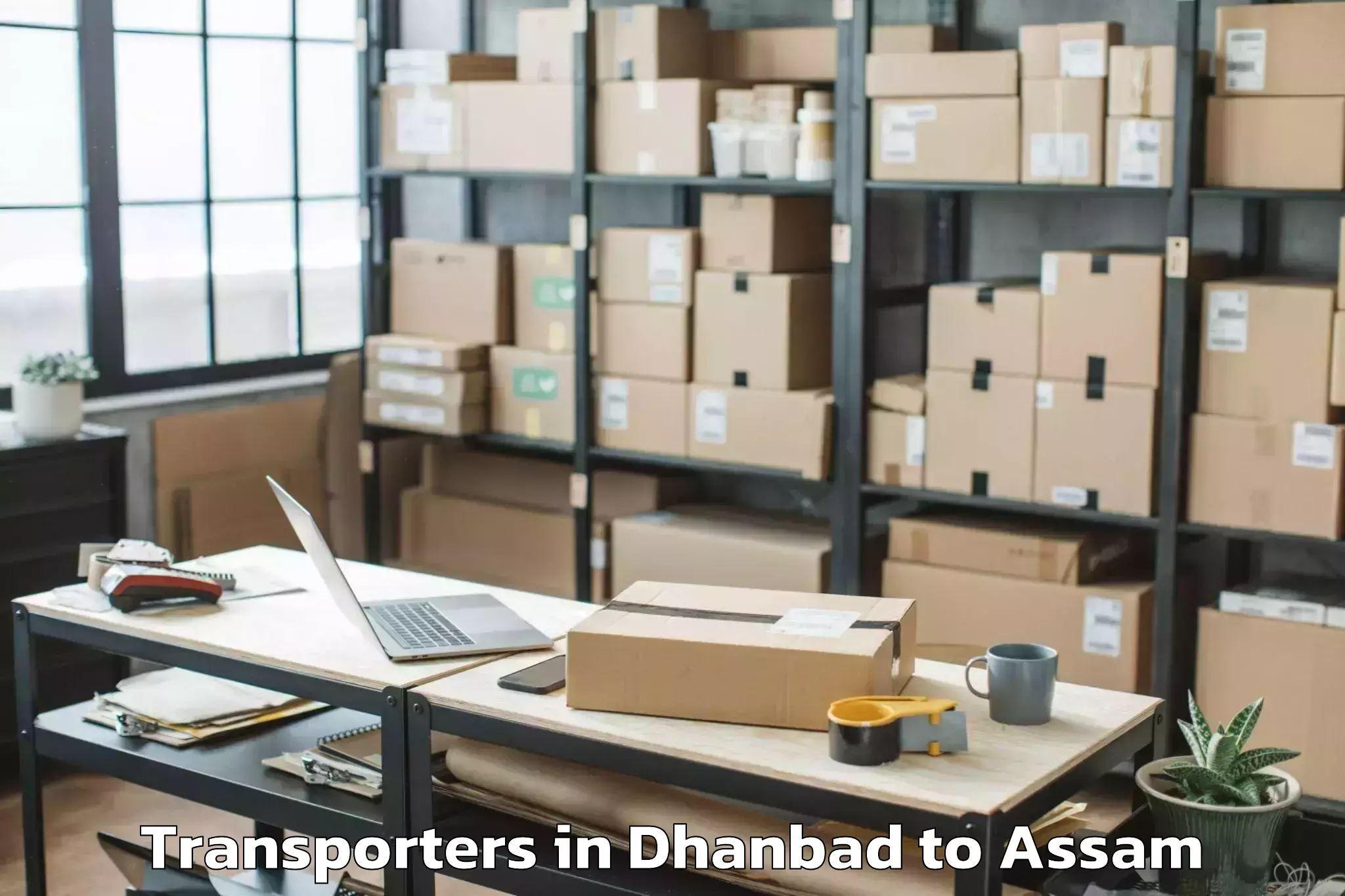 Leading Dhanbad to Dergaon Transporters Provider